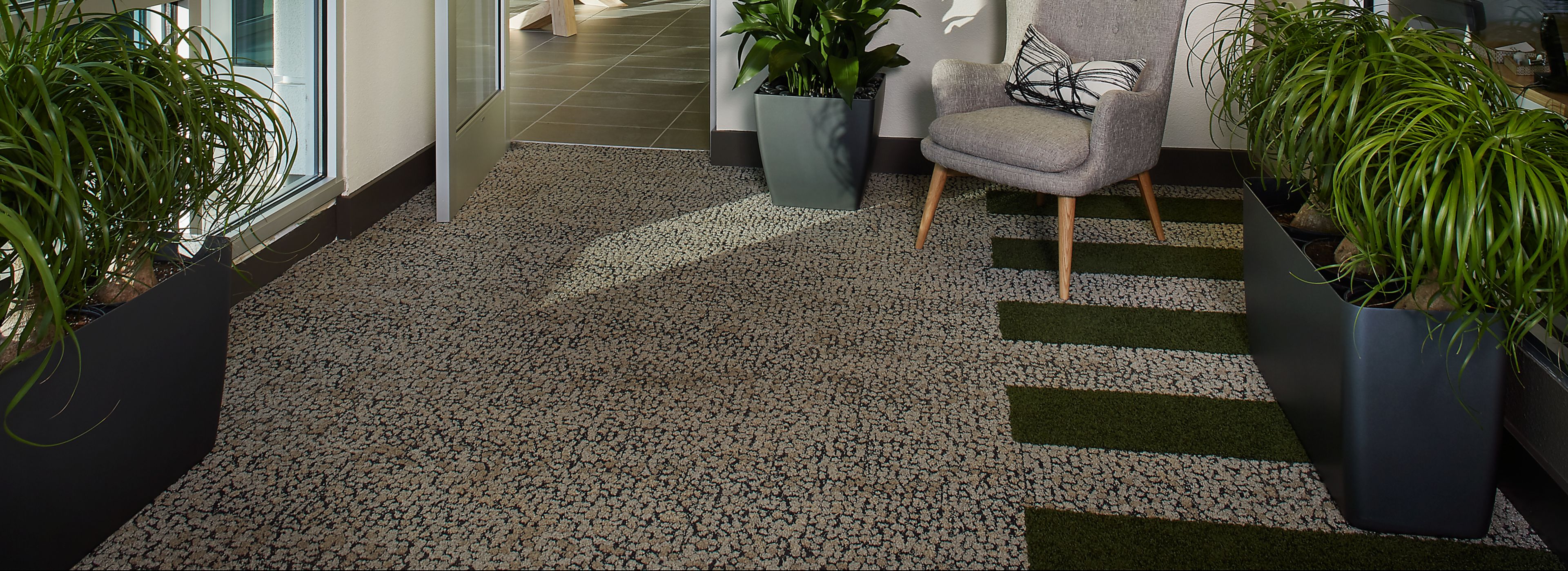 Interface HN840 plank carpet tile in foyer of Linq Leasing Office image number 1